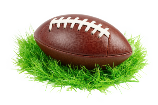 Leather American football resting on vibrant green grass isolated on white background





