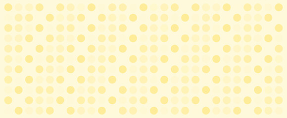 Abstract yellow polka dot pattern on a cream background, simple design