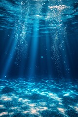 Deep ocean scene with sunlight rays shining through water and illuminating the sea floor, peaceful underwater landscape with magical lighting, Generative AI