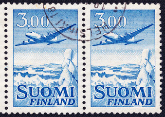Douglas DC-6. Set of two stamps from Finland, issued in 1963 feature a Airplane Douglas DC-6 flying over Finnish winter landscape. 