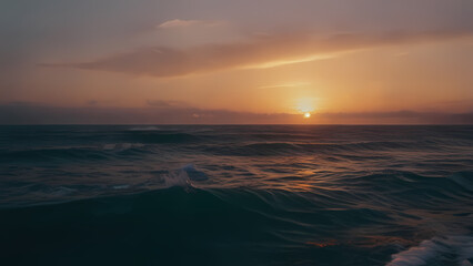 Obraz premium Magical Sunset Over the Ocean with Rippling Waves