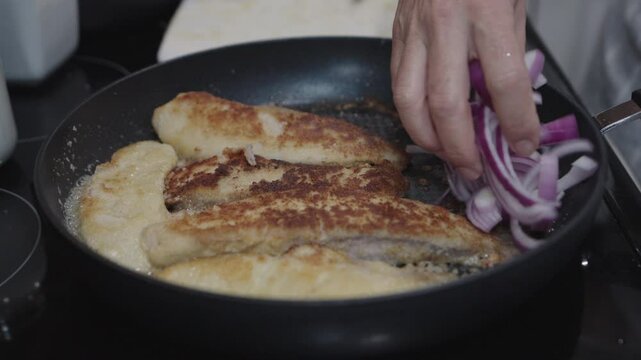 pan fried fish and onions