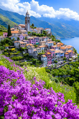 Obraz premium Colorful coastal Italian village, hillside flowers, mountains, sea. Travel postcard