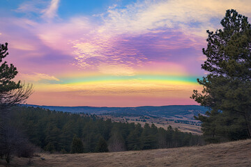 Obraz premium Ethereal Splendor: A Symphony of Colors Unveiling Nature's Majestic Embrace Against a Serene Sky