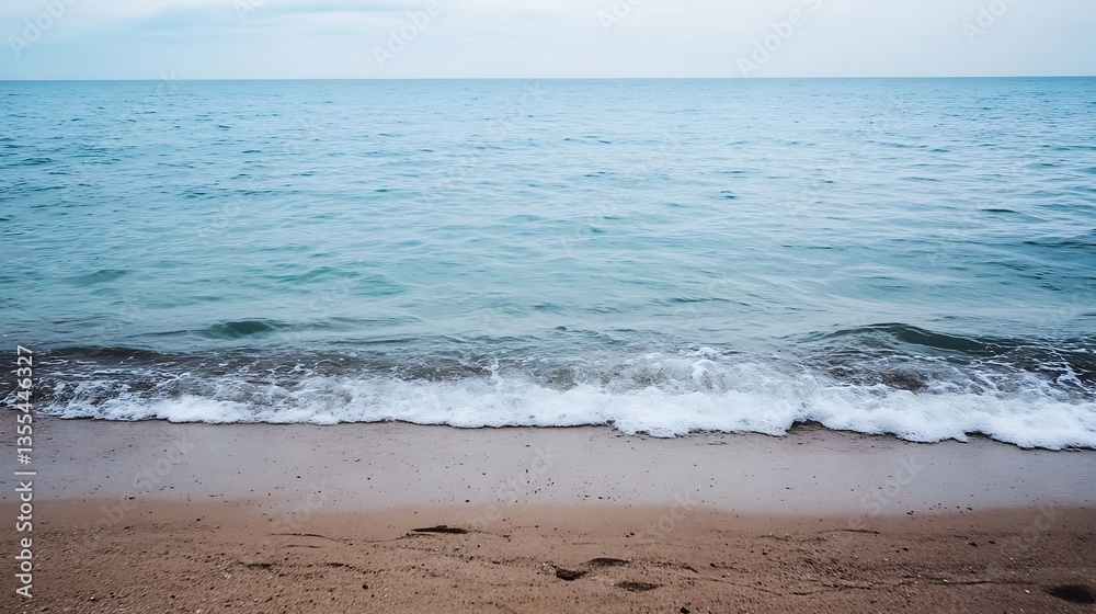 Poster Scenic view of a calm beach with gentle waves lapping against the sandy shore on a cloudy day : Generative AI