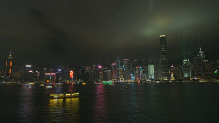 Obraz premium Light show in Hong Kong at night and Victoria Harbour