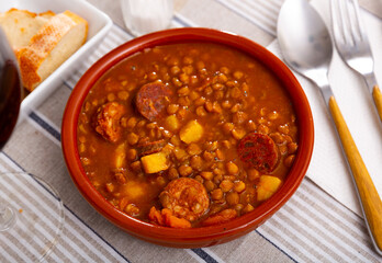 National Spanish dish Lentejas con chorizo, beans stewed with chorizo, bacon and sausages