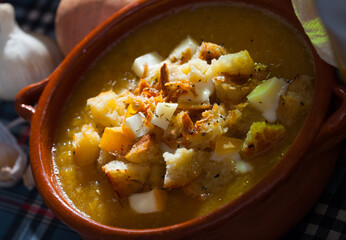 Vegetable soup with croutons and cheese. High quality photo