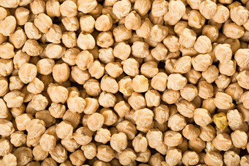 Grains of raw chickpeas as background. Natural healthy food..