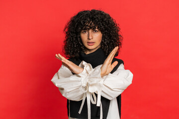 Stop, enough. Caucasian woman say no hold palm folded crossed hands in finish gesture, warning of...