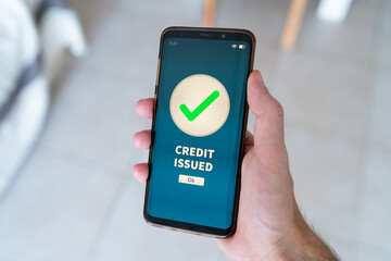 Credit issued notification on smart phone.
