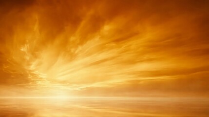 The golden sky above a calm and reflective water surface
