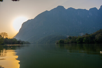 Golden Sunset Over the Nam Ou River and Limestone Mountains in Ngoy District, Northern Laos