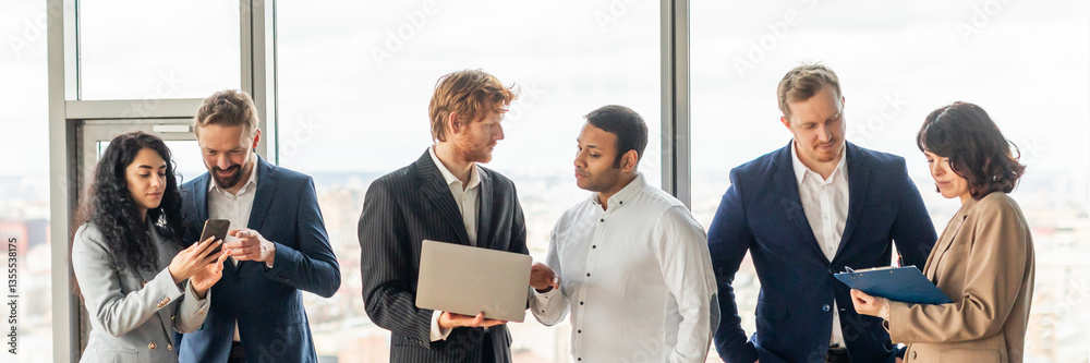 Poster a group of business professionals stand in a modern office space, discussing business while looking 