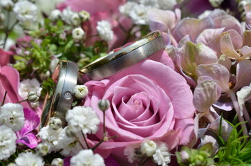 Wedding Rings Among Beautiful Flowers