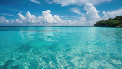 Fototapeta premium Crystal clear sea water cove. Pristine ocean lagoon with a sunny cloudy sky, idyllic relaxing seascape. Transparent surface, exotic getaway. Summer backdrop, beach scenery.