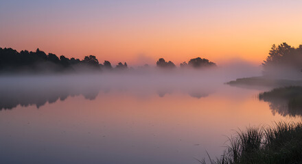 Fototapeta premium Serene Lake at Dawn with Foggy Reflections and Pastel Sky Colors Radiance