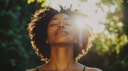 Young Woman Embracing Natural Light and Serenity While Meditating in Lush Green Environment