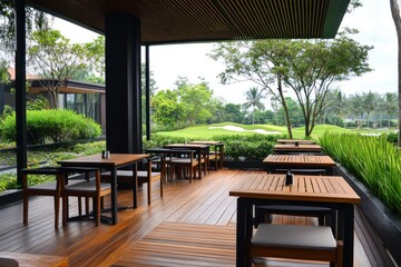 Obraz premium Outdoor patio dining area with golf course view (1)