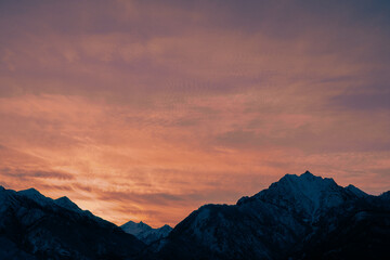 Elevated Beauty: Frozen Canadian peaks

A breathtaking view of frozen Canadian mountains at high elevations. Towering, snow covered peaks contrast against a vivid winter sky.