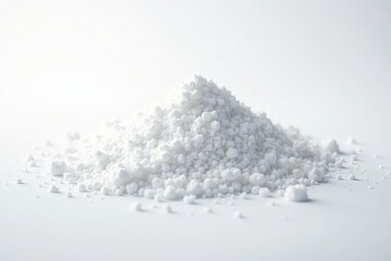 Luminous mound of white sugar against a stark white backdrop, clean, natural