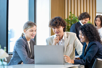 Team of diversity business people are discussing over the new strategic strategy project on investment real estate while working in modern office building for new project and planning usage