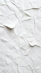 Fototapeta premium Crumpled paper texture with sharp folds and bright white tone, capturing light and shadow play.