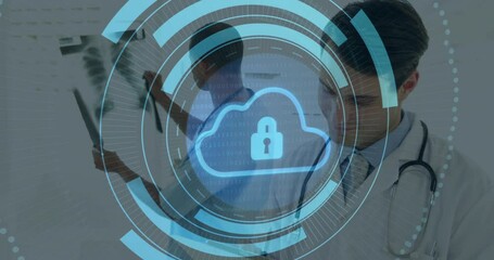 Cloud security animation over medical professionals working with digital data - Powered by Adobe