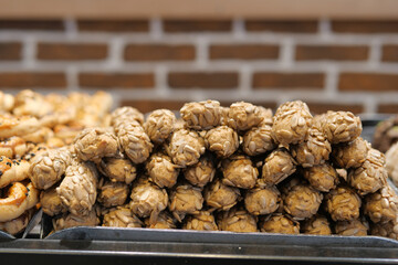 Freshly made sunflower seed snacks in a bakery display case