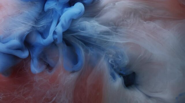 Cloud mix. Paint burst. Blue puff spray shot spread in brown white liquid. Abstract water color explosion blur fantasy mist background.