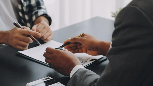 Dealership offered various finance options, including an auto loan or lease, making it easier to buy or rent a car from the company. Agent reviewed contract, finalizing insurance agreement.