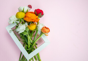 Colorful fresh buttercups bouquet. Mother day gift. Spring, women day