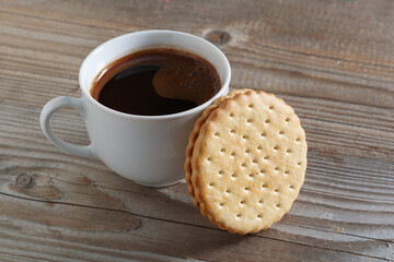 Coffee and sandwich cookie