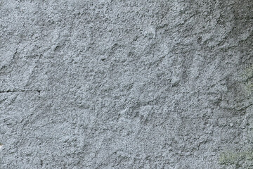 Texture concrete wall of light grey color cement texture background.Grey pastel rough crack cement texture stone concrete,rock plastered stucco wall; painted flat fade background. Side view.