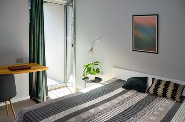 Scandinavian interior style modern bedroom in white and grey colors, minimalist furniture in bedroom area