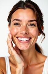 Fototapeta premium Beautiful smiling woman touching her face showing perfect white teeth