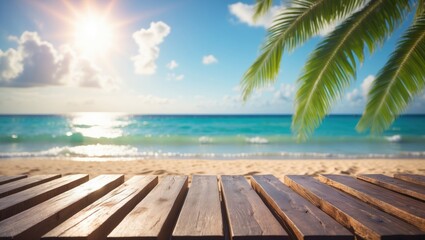 Fototapeta premium A wooden table product showcase set against a backdrop of a tropical beach, blue ocean, white clouds, sun flare, and green palm fronds.