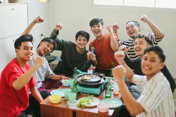 Portrait of Happy Group of Friends Having Lunch Together in a Restaurant