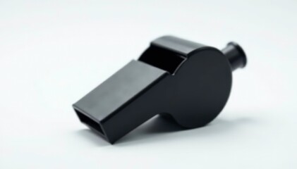 Black plastic whistle, close-up view, pure white backdrop , sound, tool, sports equipment