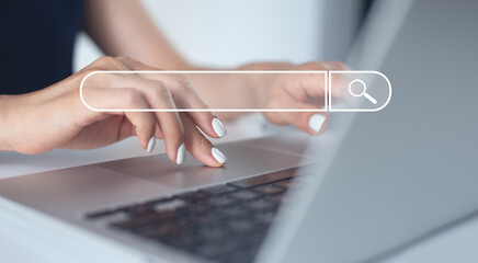 Business woman searching online information on laptop computer, web browser webpage. SEO Search Engine Optimization and data search technology concept with Internet global network connecting