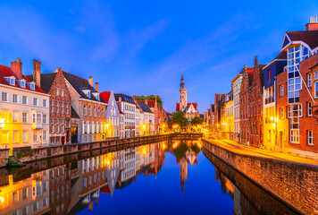 Naklejka premium Bruges, Belgium: Night view of the Burg quarter from Spiegelrei canal