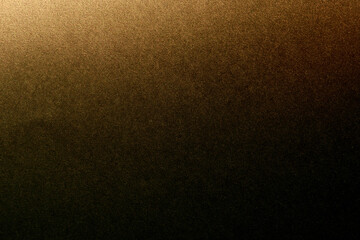golden spray paint gradient on black color paper