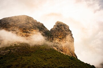 Majestic mountain peak shrouded in mist.