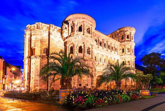 Trier, Germany: Sunset view of the Porta Nigra or Black gate in Ancient roman city Augusta Treverorum, Rhineland-Palatinate, Europe