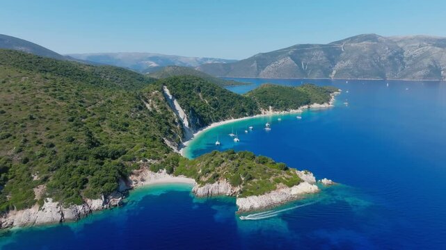 Slow panning drone shot of Evaki and Gidaki beaches in Ithaca island, Greece