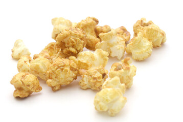 Popcorn heap,Close-up of popcorn against white background - stock photo
