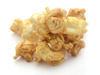 Popcorn heap,Close-up of popcorn against white background - stock photo
