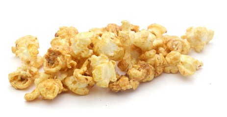 Popcorn heap,Close-up of popcorn against white background - stock photo
