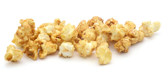 Popcorn heap,Close-up of popcorn against white background - stock photo

