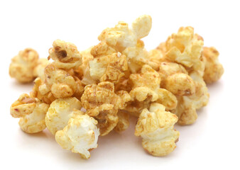 Popcorn heap,Close-up of popcorn against white background - stock photo
